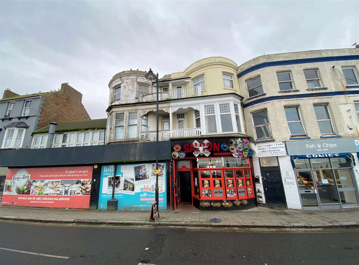 The long-derelict formerTivoli arcade has been partially demolished, and its front concealed with boards. Now, the city council has pledged it will be fully gone by the spring