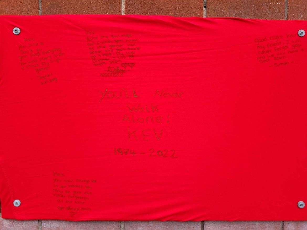 Tributes were written on the red material, on a wall outside the pub, throughout the night. Picture: Jay Ryan
