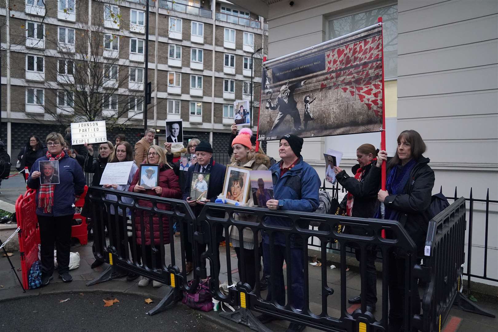 Protesters gathered outside the UK Covid-19 Inquiry (Jonathan Brady/PA)