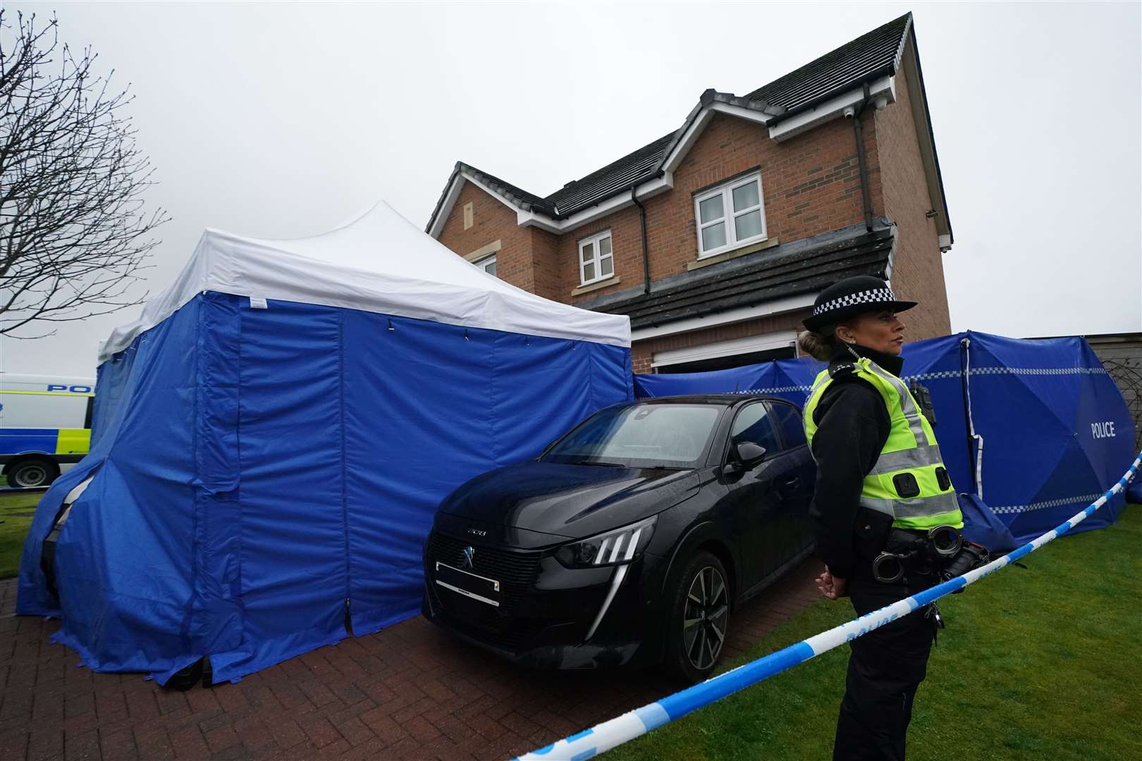 Peter Murrell and Nicola Sturgeon’s home being searched by police (Andrew Milligan/PA)