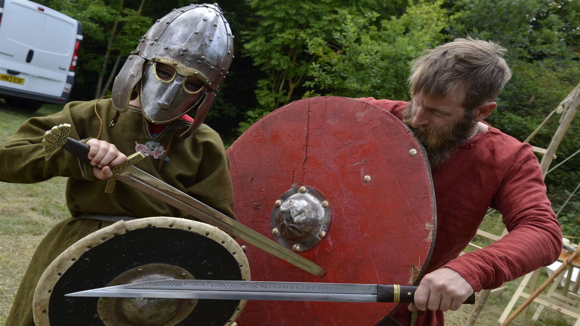 Lewis Geer, eight, of Sittingbourne takes to battle with a Saxon warrior Mark Denyer