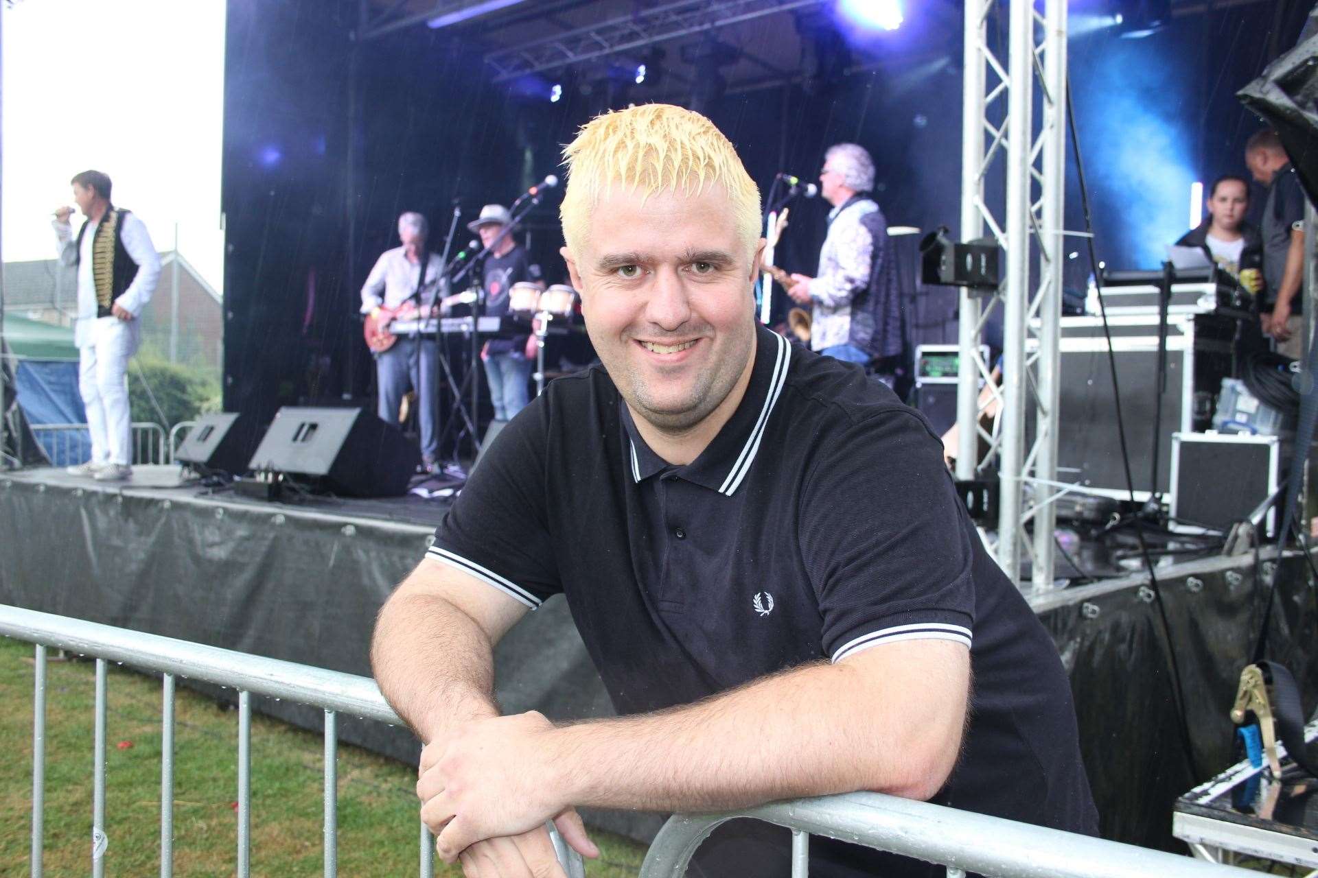 Smiling through the rain: Paul Gambell, organiser of Woodfest, Sittingbourne, on Saturday. Picture: John Nurden (14413510)