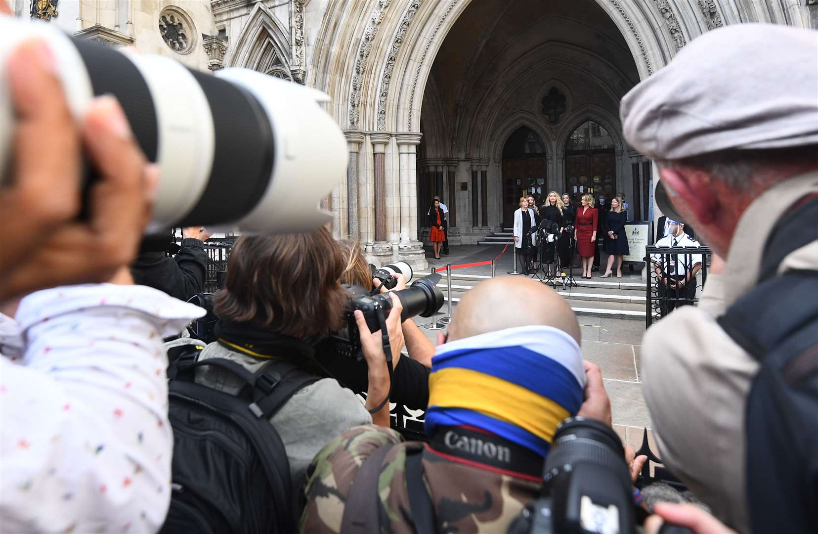 The media outside court (Victoria Jones/PA)