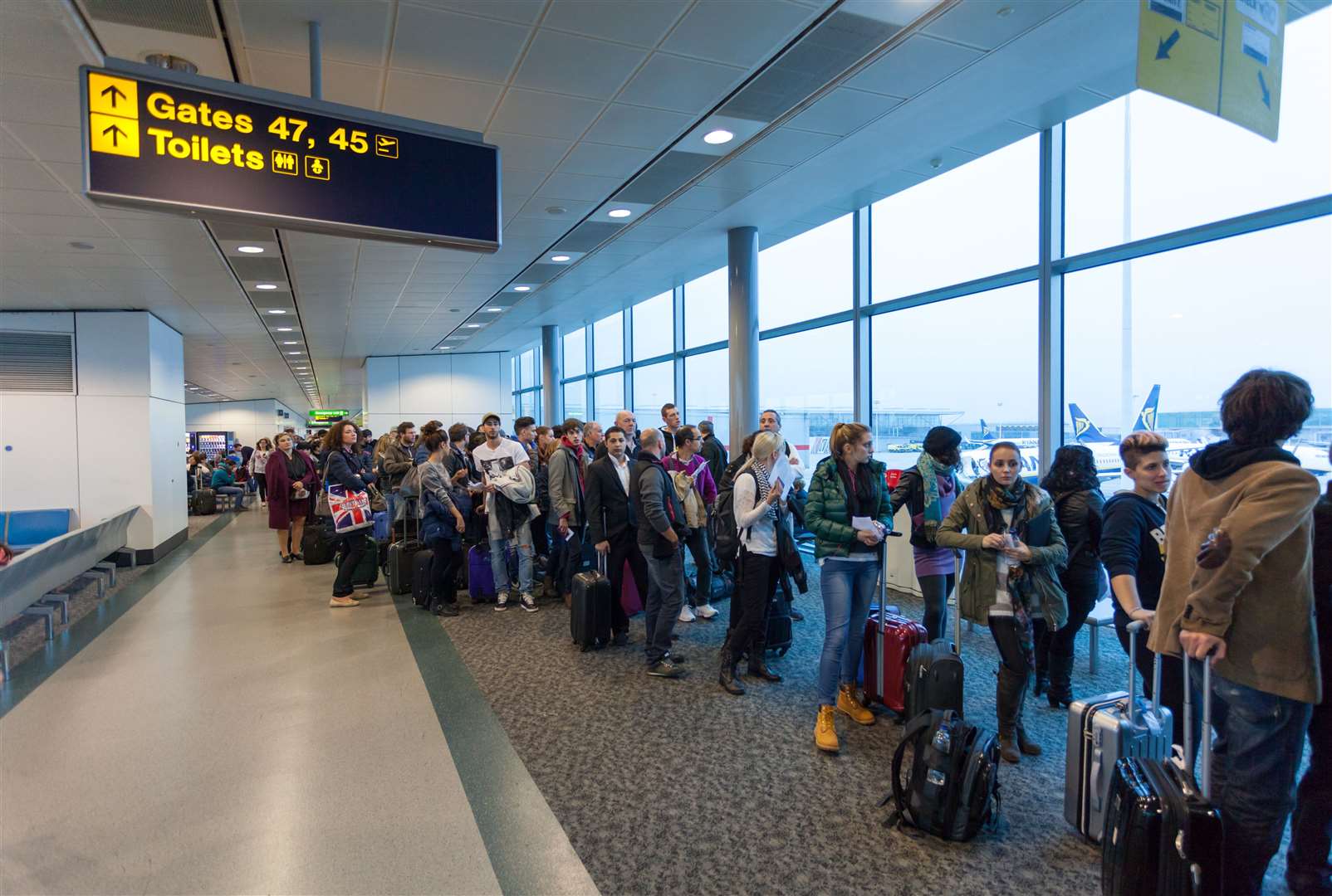 The government hopes to avoid long queues at airports this summer that hold passengers up