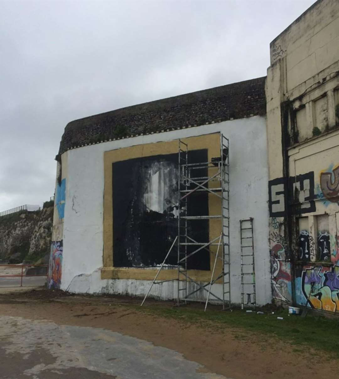 The Sir David Attenborough mural has been painted on a wall near Margate lido. Picture: @pad303