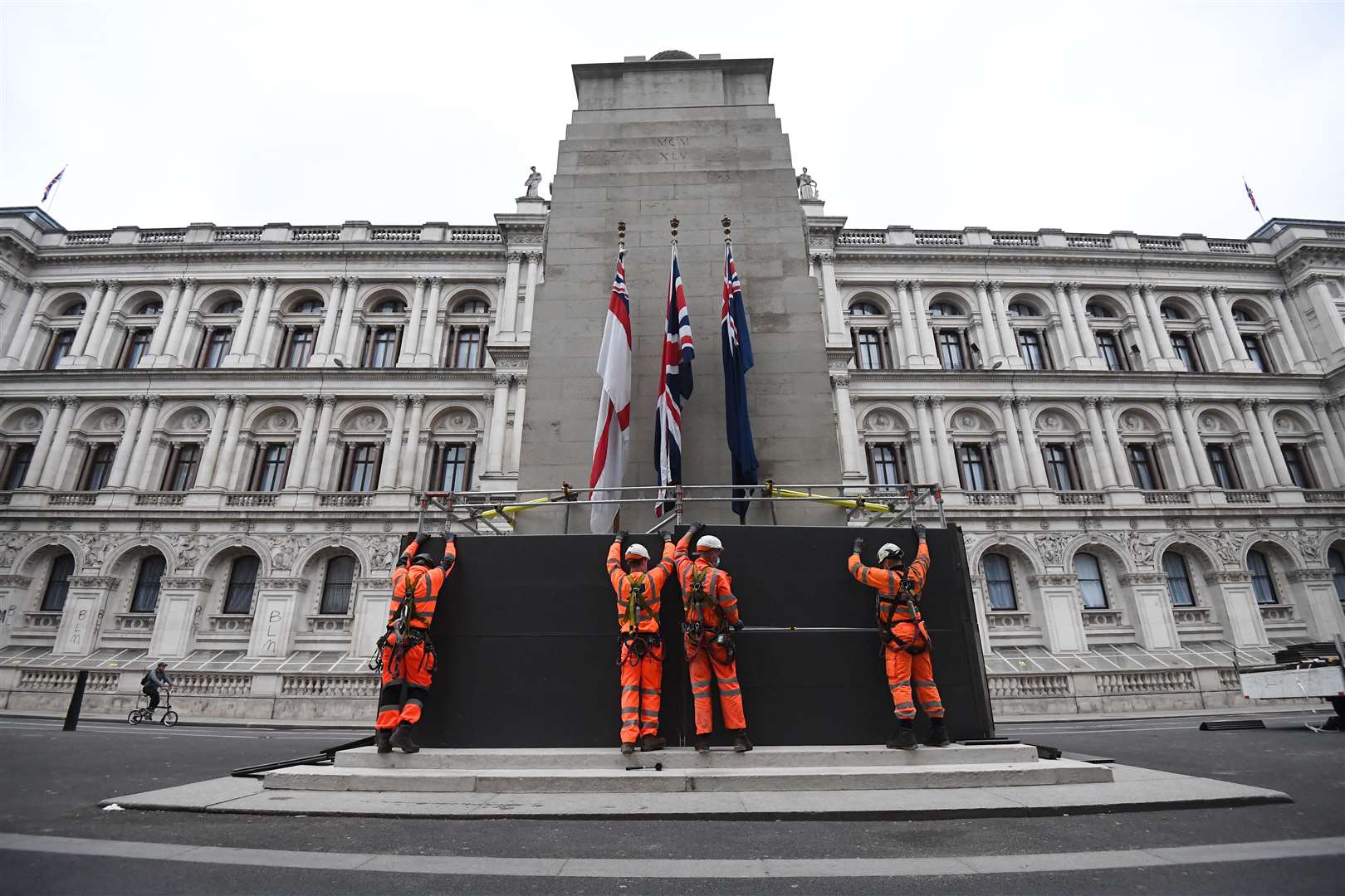 Scaffolders erect boarding around the Cenotaph on Whitehall (Kirsty O’Connor/PA)