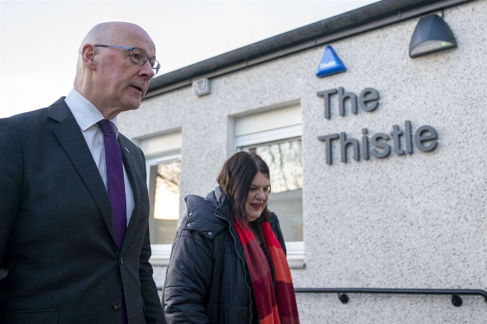 First Minister John Swinney and Glasgow City Council leader Susan Aitken outside the Thistle Centre (Jane Barlow/PA)