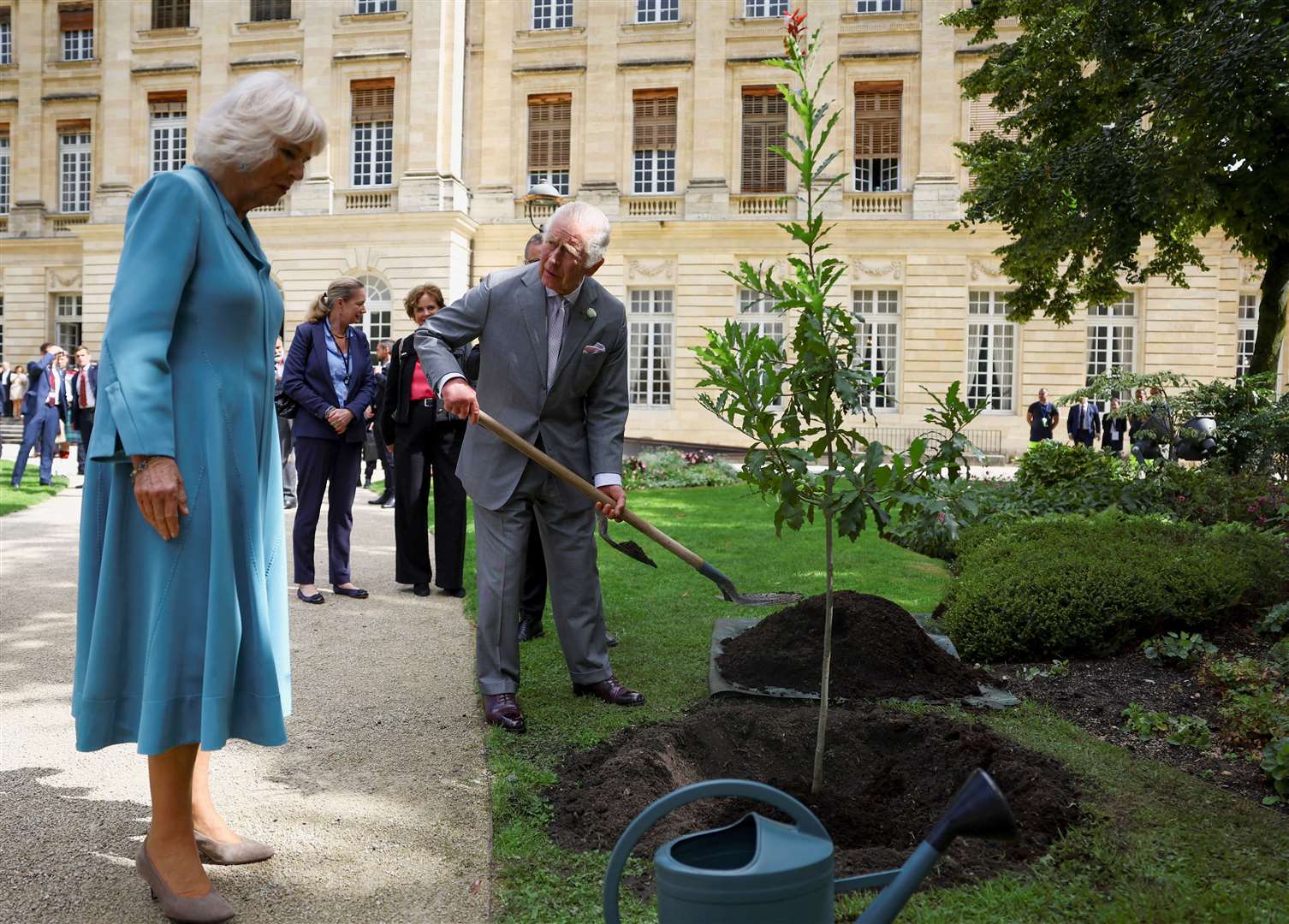 The royal couple planted a loquat leaf oak tree in the gardens of the town hall in Bordeaux (Hannah McKay/PA)