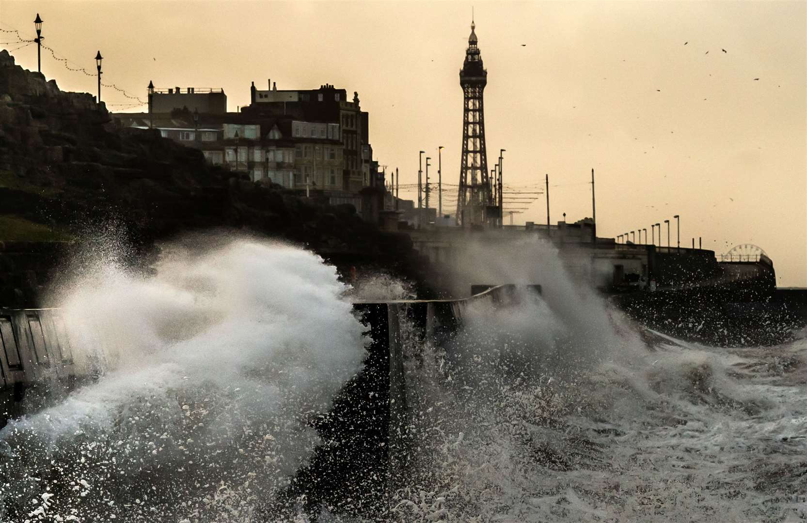 Waves break on the seafront in Blackpool during Storm Isha (Danny Lawson/PA)