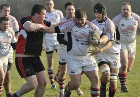 Sheppey (white) push forward against fellow strugglers Vigo