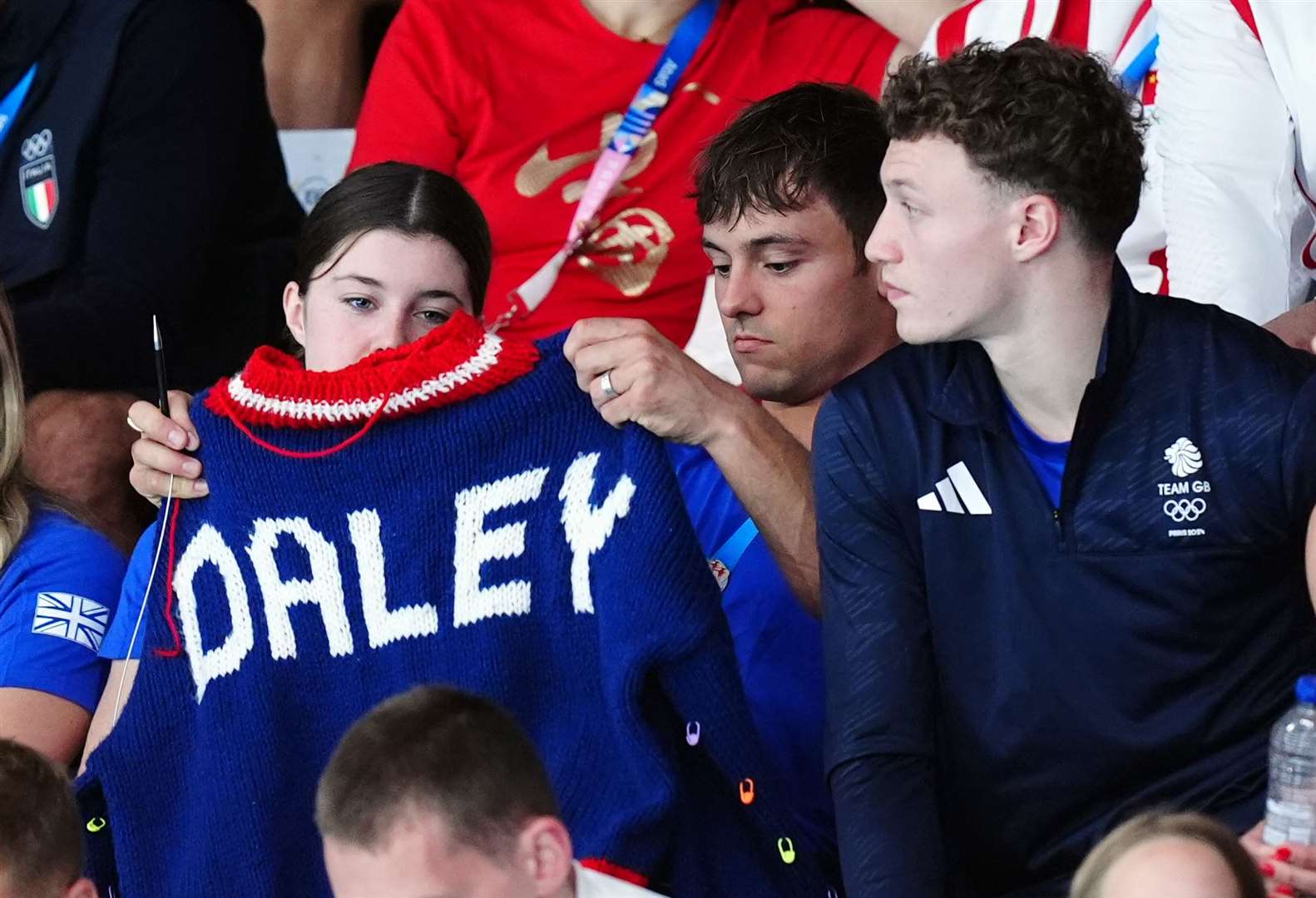 Tom Daley holds up his latest knitwear creation (Mike Egerton/PA)