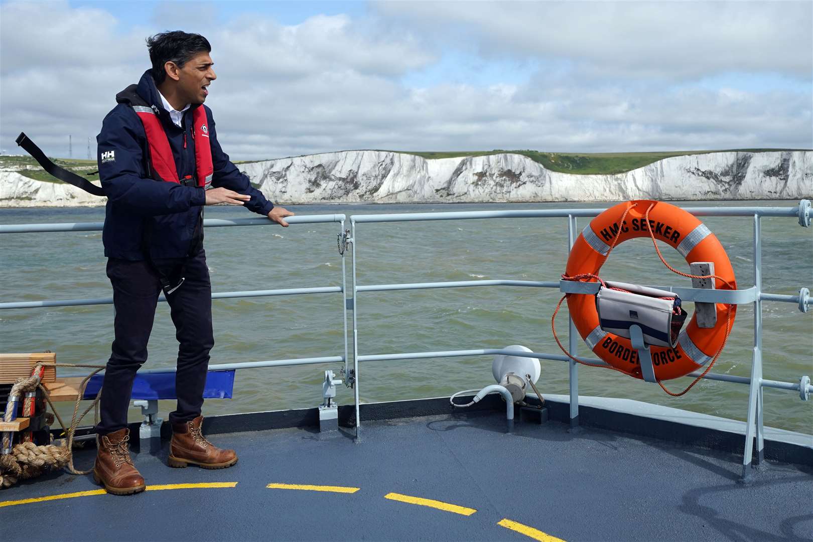 Prime Minister Rishi Sunak onboard Border Agency cutter HMC Seeker during a visit to Dover, ahead of a press conference to update the nation on the progress made in the six months since he introduced the Illegal Migration Bill (Yui Mok/PA)