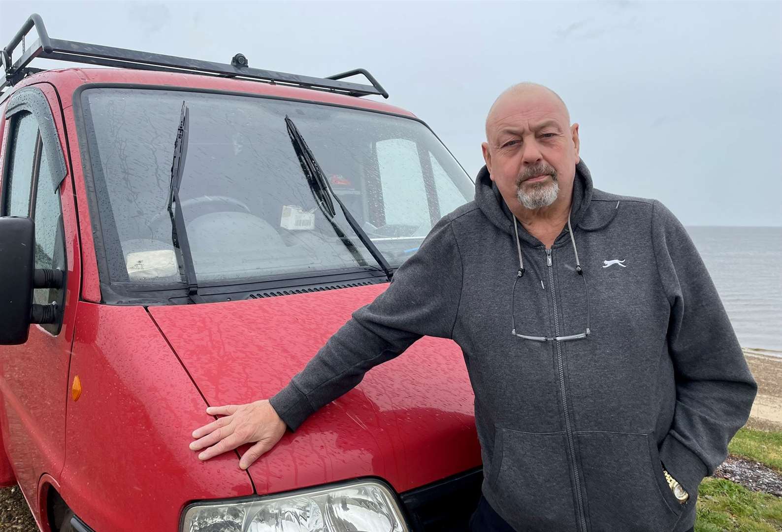 Jim Smart, from Sheerness, parks up to sit by the sea and play his piano. Picture: Joe Crossley