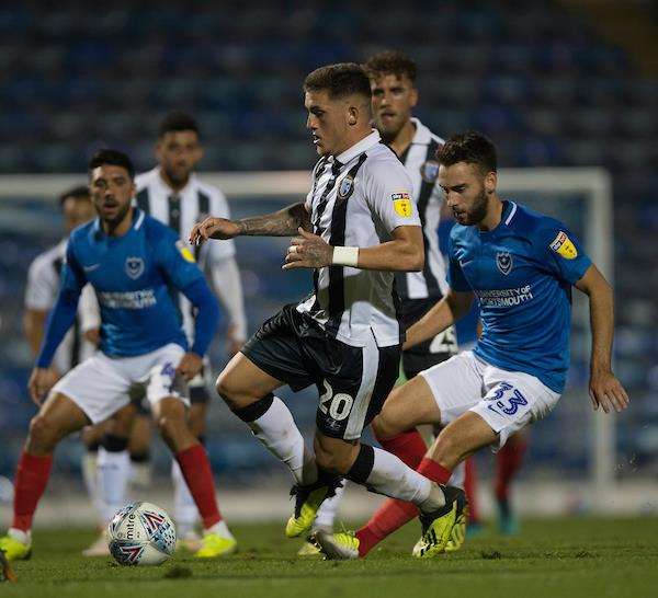 Gillingham’s Darren Oldaker challenges with Portsmouth’s Ben Close Picture: Ady Kerry (3979541)