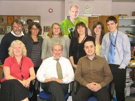 End of an era - Deputy editor David Jones has left the building. Back row - The team: Alan, Wendy, Lynn, Hayley, Jenni and Keyan. Front row - Sarah C, David J and Lee. Guest appearance by Lawrence Dallaglio