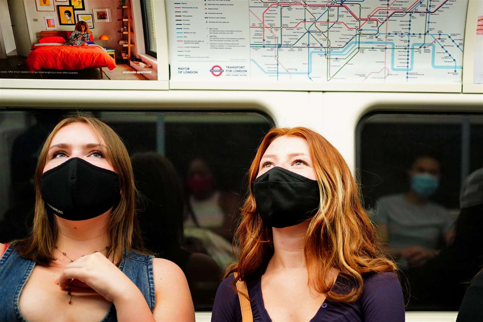 Facemasks were made mandatory for travelling on public transport in England in June, but it was not until July that they were required inside shops (Victoria Jones/PA)