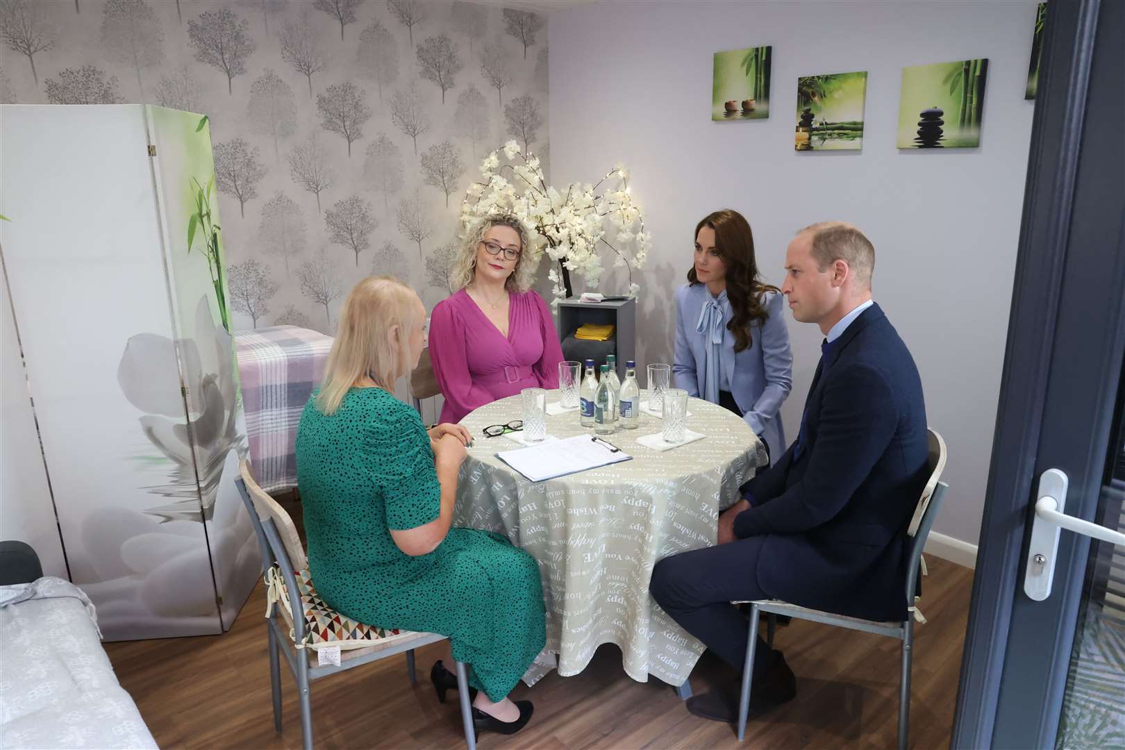 The Prince and Princess of Wales with (left to right) Martina McIlkenny, Care Team Manager and Renee Quinn, PIPS Executive Director (Liam McBurney/PA)