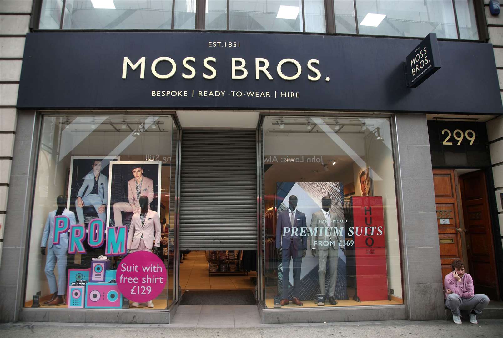 Moss Bros currently runs 128 stores across the UK (Yui Mok/PA)