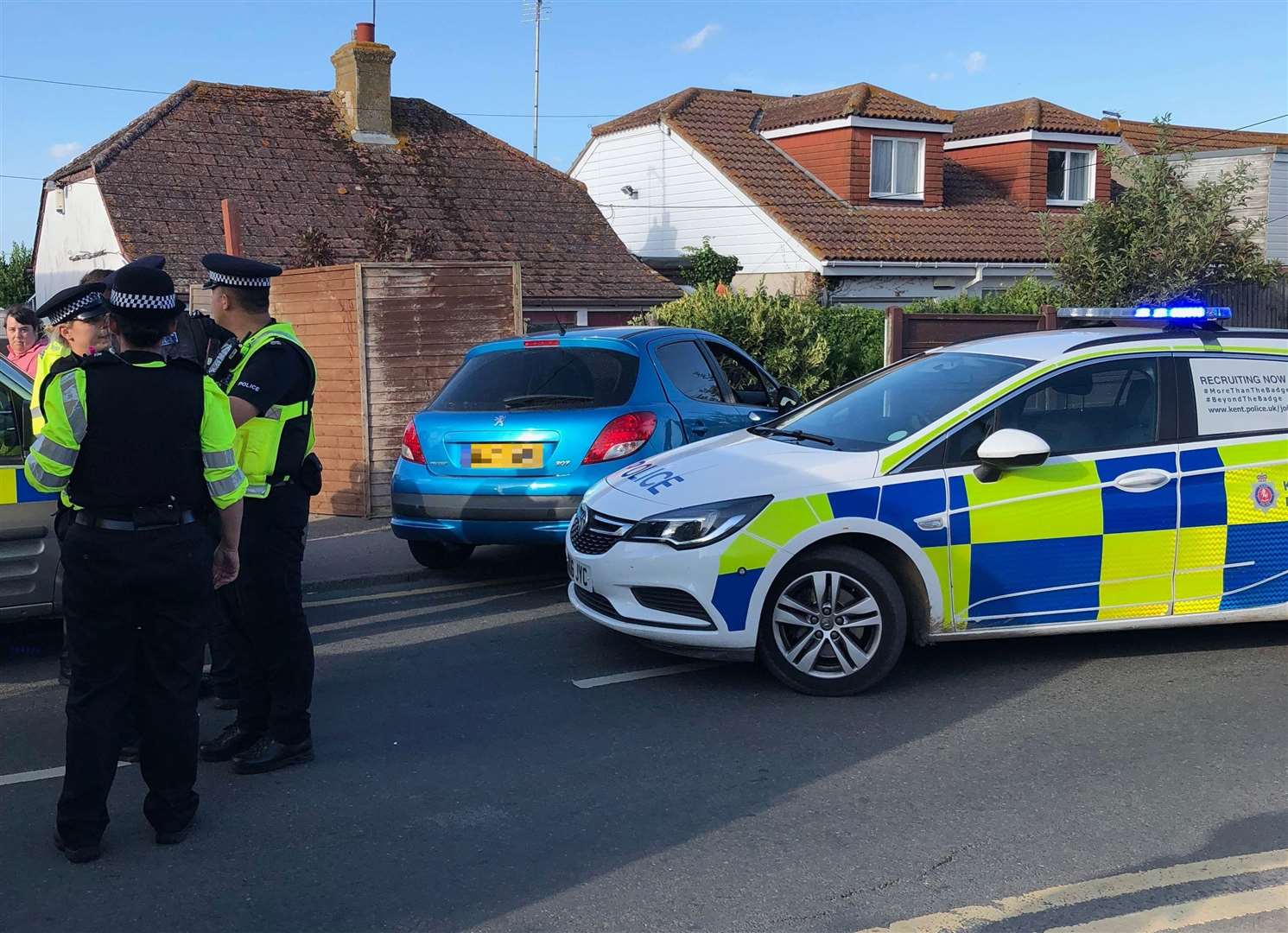 Police next to the Peugeot which crashed on Leysdown Road