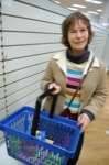 Jan Bailey, of Maidstone, grabs a few final bargains on the last day of trading for Woolworths in Week Street, Maidstone. PIcture: David Antony Hunt