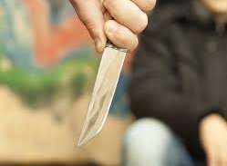 The teenager was armed with a knife. Stock image