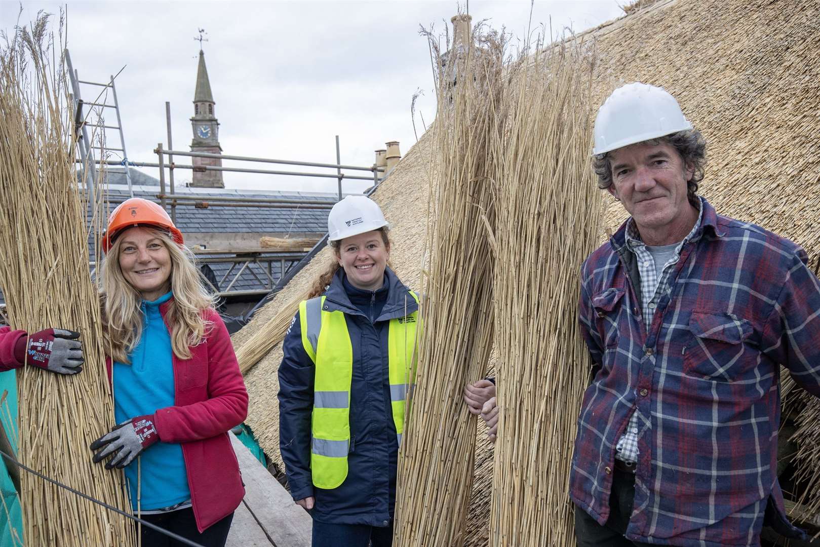 Thatcher Jane Benwell and Laura-Baillie, NTS building conservation surveyor, with Jonathan Botterell (NTS/PA Wire)