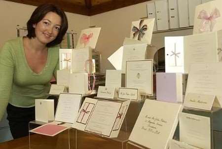Katharine with a selection of her wedding stationery. Picture: DAVE DOWNEY