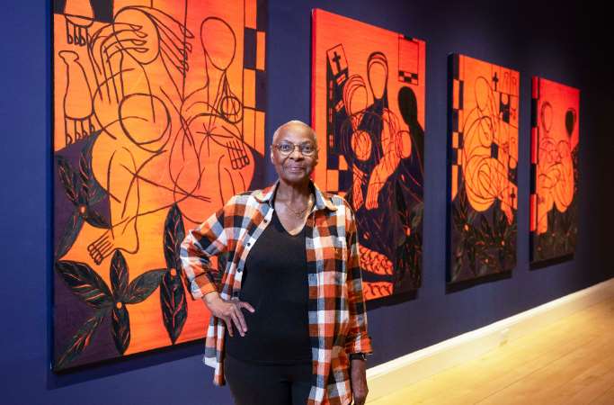 Everlyn Nicodemus with works from her new series, Lazarus Jacaranda (2022–24), which was created for the exhibition (Neil Hanna/PA)