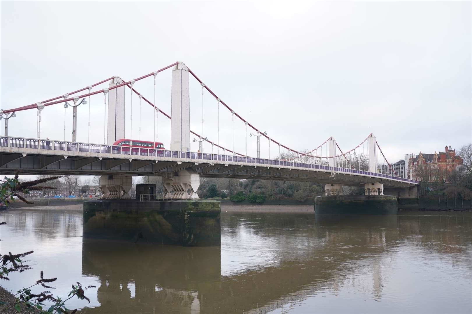 Police searched the area near Chelsea Bridge at low tide (Lucy North/PA)