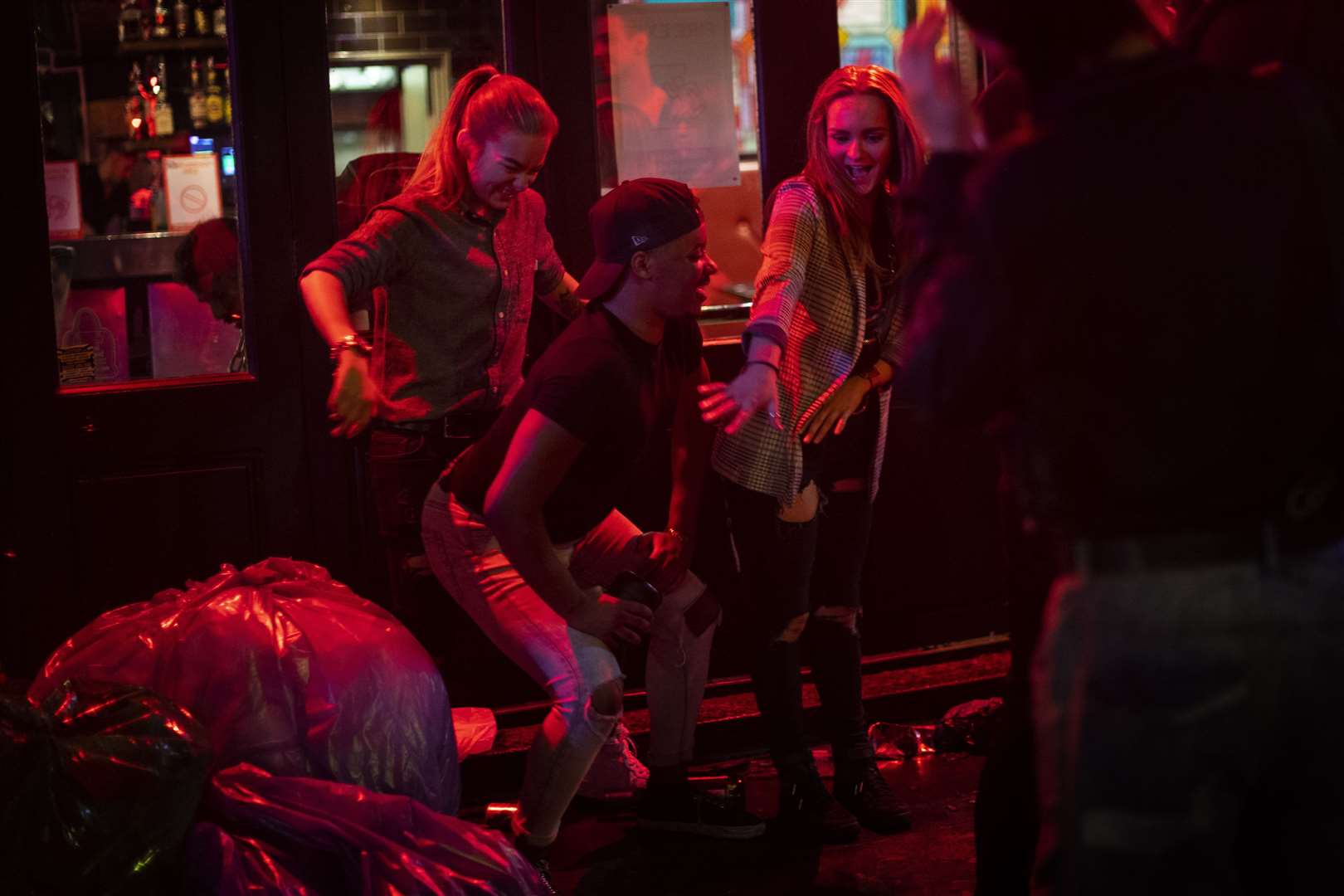 Late-night drinkers in Soho dance on the street in the early hours of Sunday morning (Victoria Jones/PA)