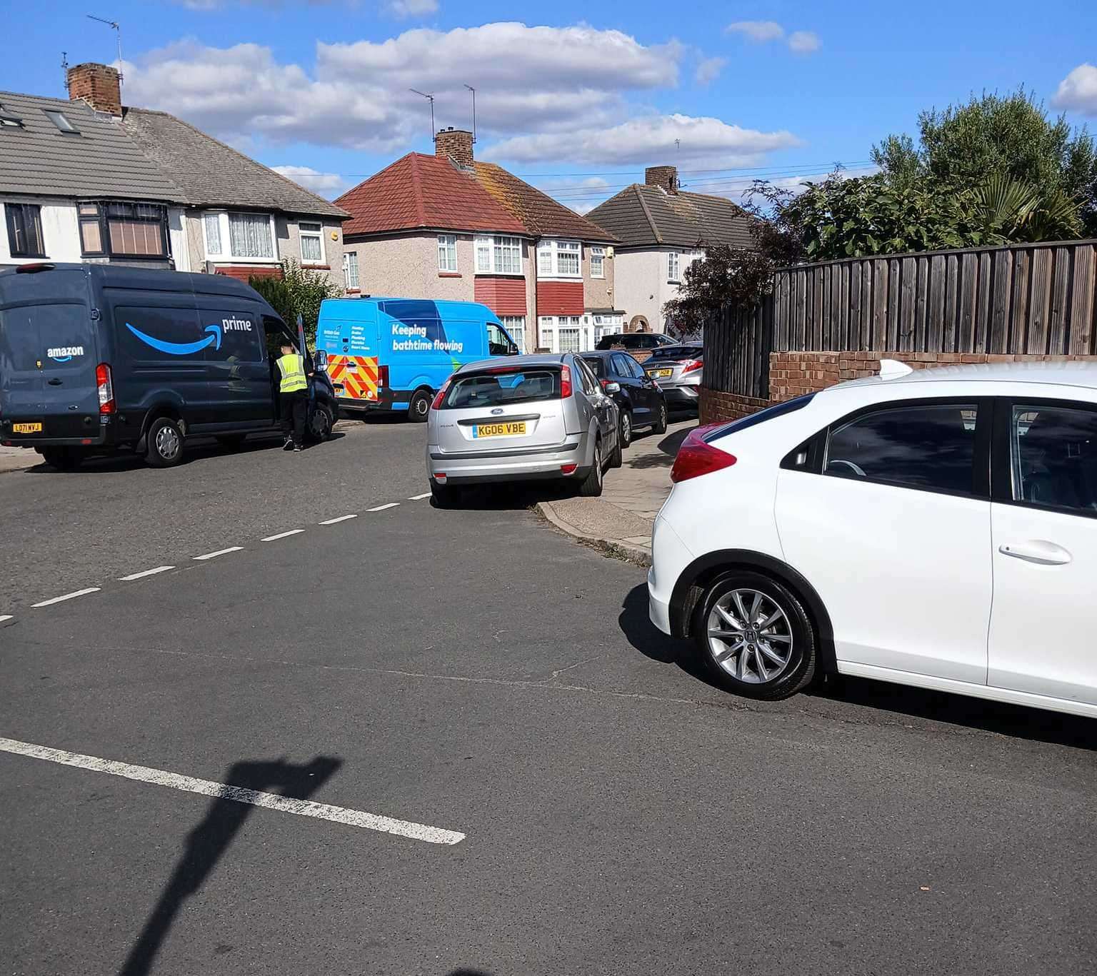 Cars parked in Chatsworth Road, Dartford at school drop-off and pick-up times