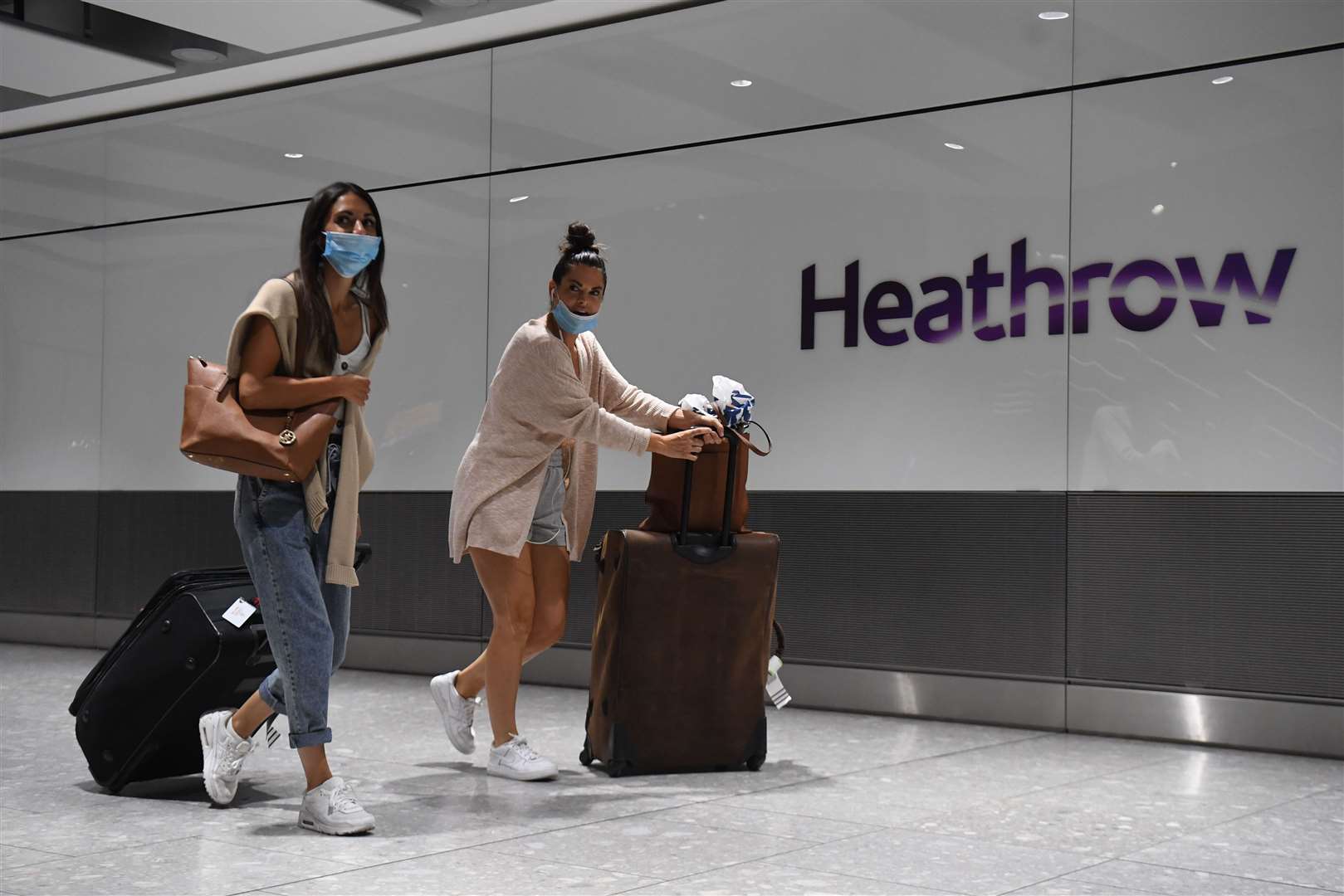 Passengers arrive at Heathrow Airport after a flight from Dubrovnik, Croatia (Kirsty O’Connor/PA)