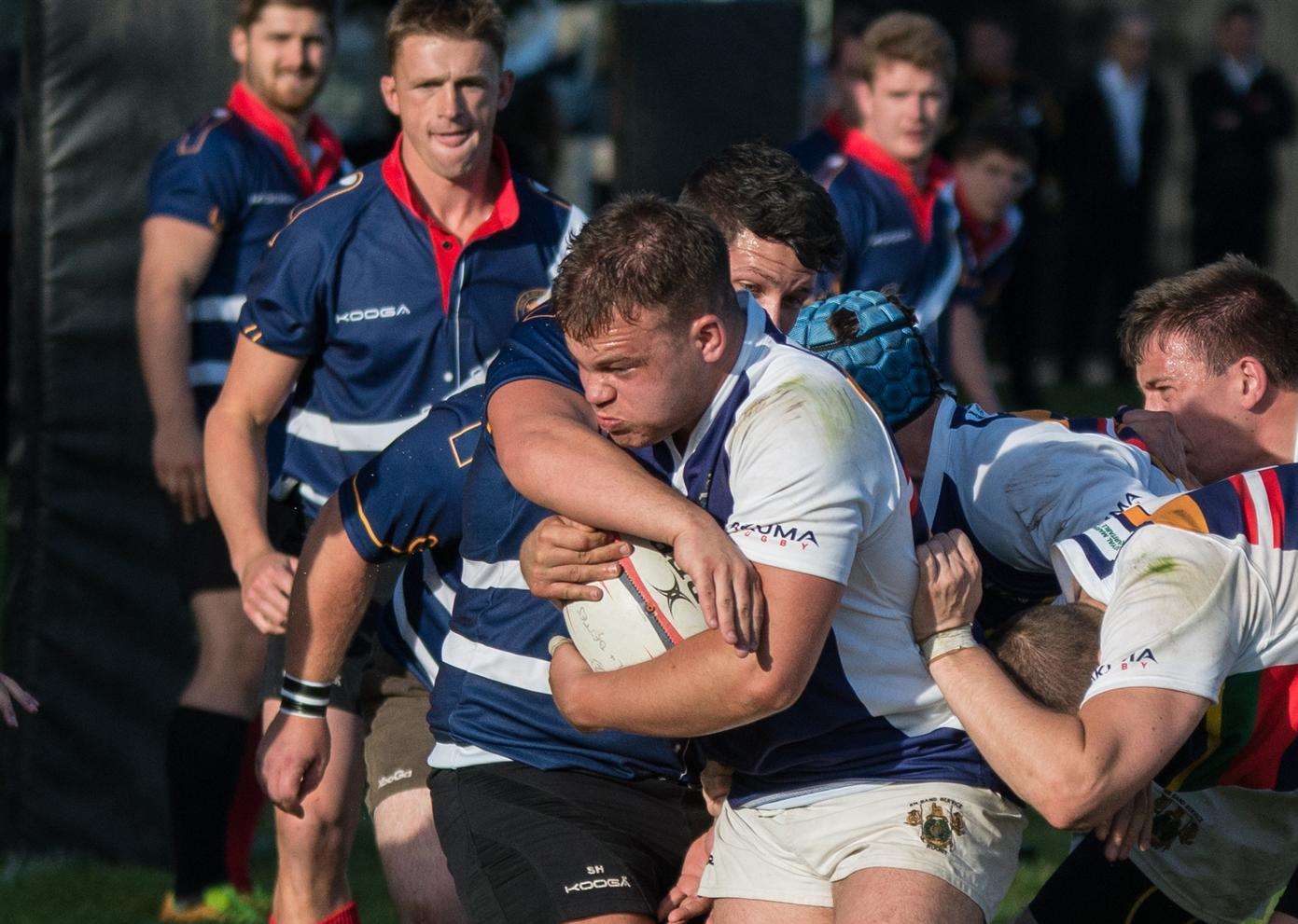 The Royal Marines Band Service get control of the ball, eventually winning 40-14