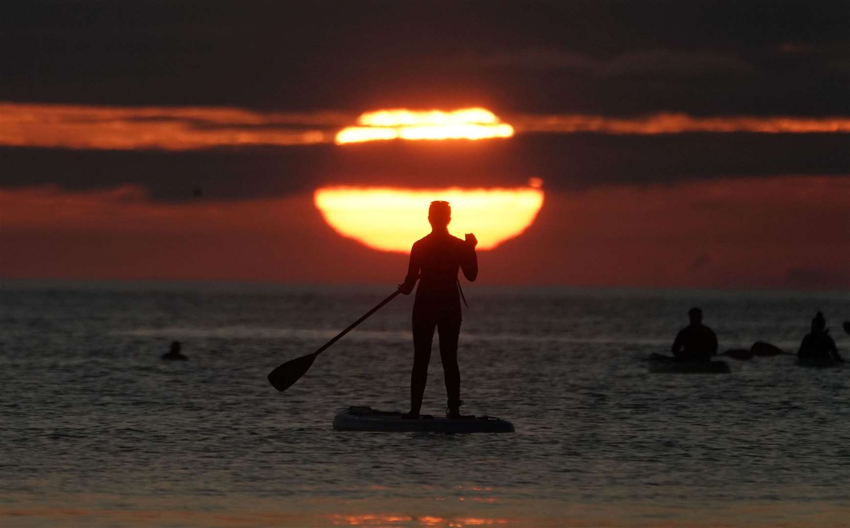 There was more beautiful weather in August, resulting in this spectacular sunrise at Cullercoats bay in North Tyneside (Owen Humphreys/PA)