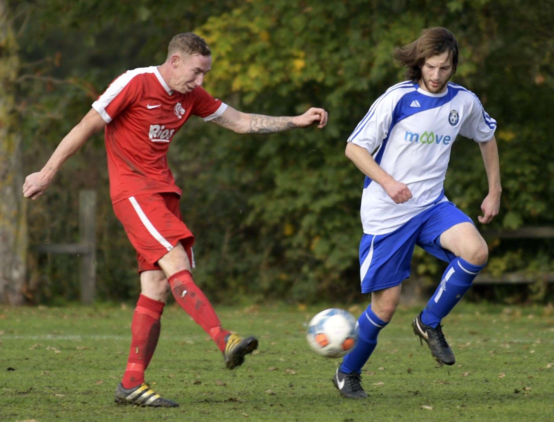 AFC Tigers (red) go for goal against Moove. Picture: Barry Goodwin (42745144)