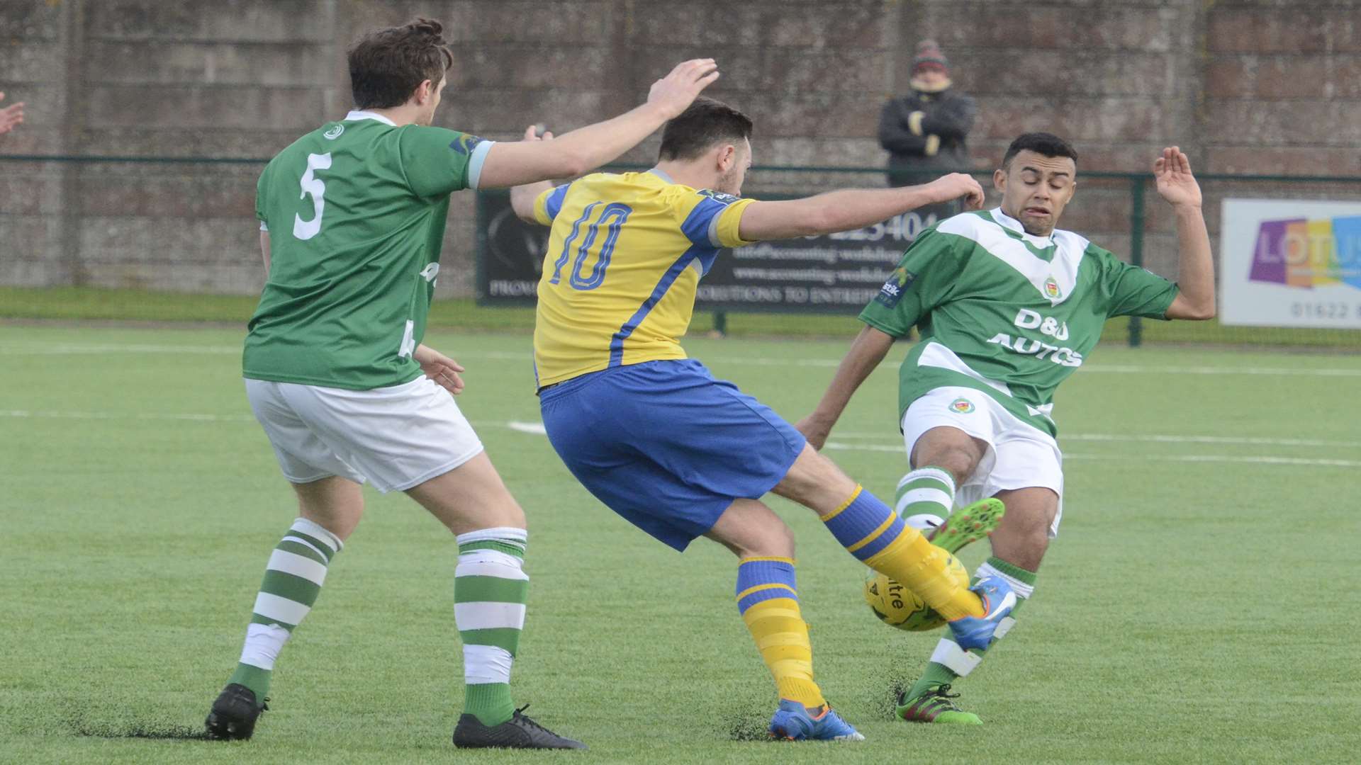 Ashford's Ryan Richefond closes down Sittingbourne's Miles Cornwell Picture: Chris Davey