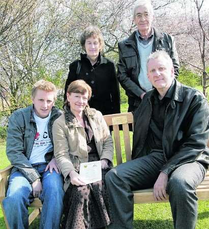 Robert, Janet and Roger Maddams sitting with Mary and Brian Carter standing.