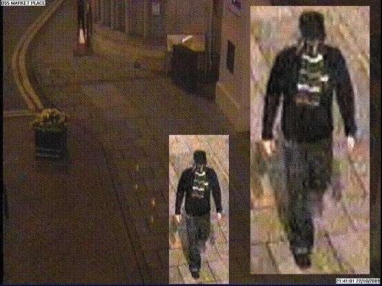 A CCTV image of a suspect in the Alan Wood murder case