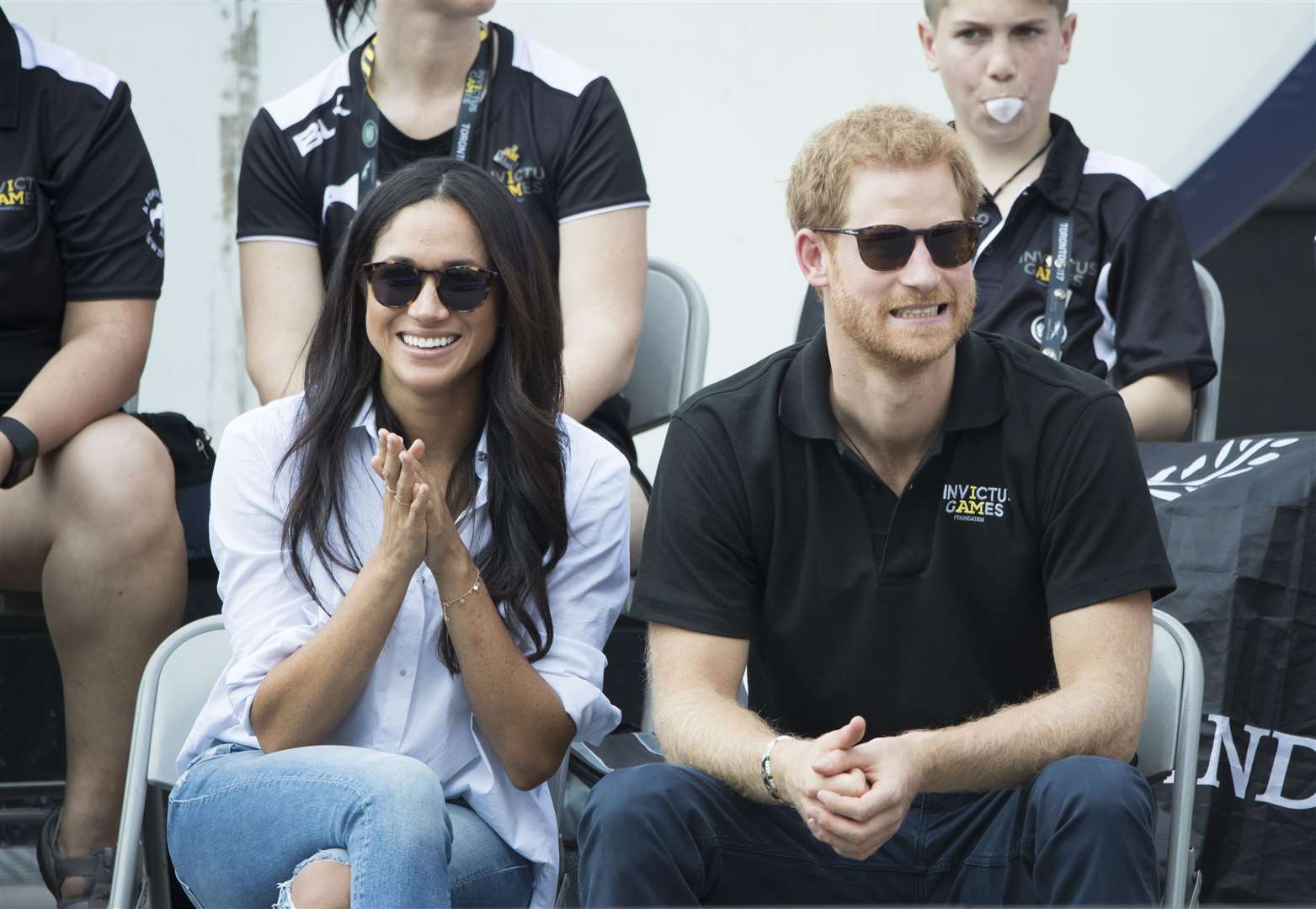 Harry and Meghan watch Wheelchair Tennis at the 2017 Invictus Games in Toronto, Canada (Danny Lawson/PA)