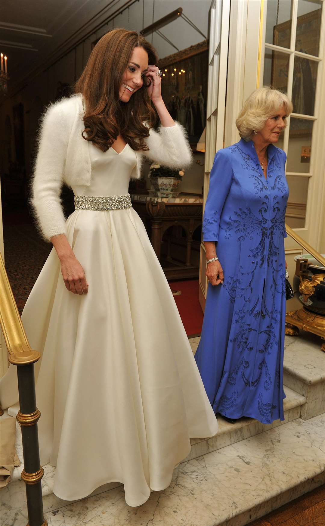 The Duchess of Cambridge and the Duchess of Cornwall leave Clarence House to travel to Buckingham Palace for the evening celebrations (John Stillwell/PA)