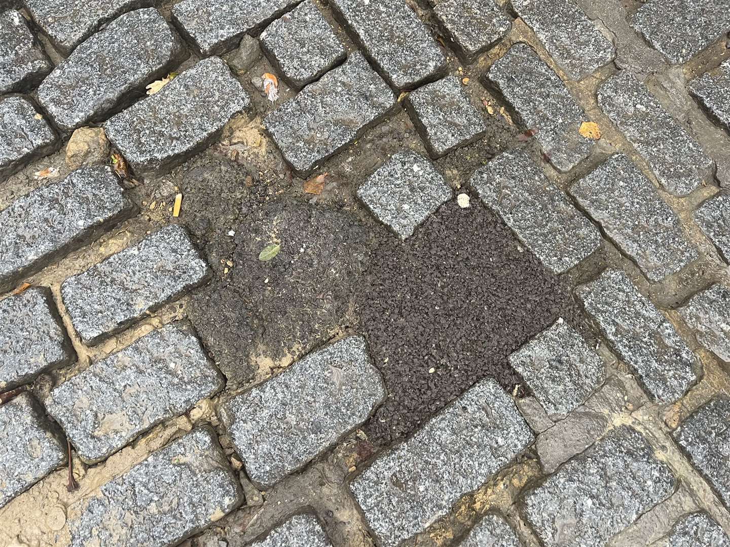 The cobbles will be replaced with black tarmac