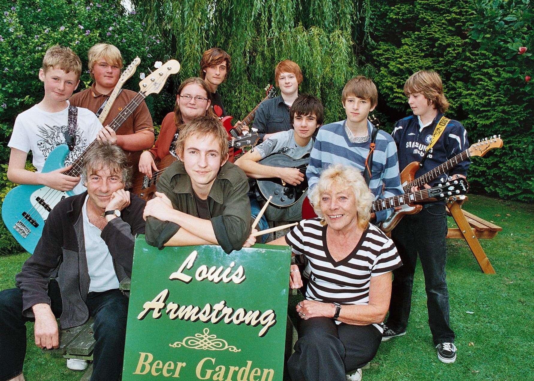 A Beer and Bands event at the Louise Armstrong, Dover. Pictured are Bert Osborn (front left) and Jackie Bowles with Bert's students who played at the event.