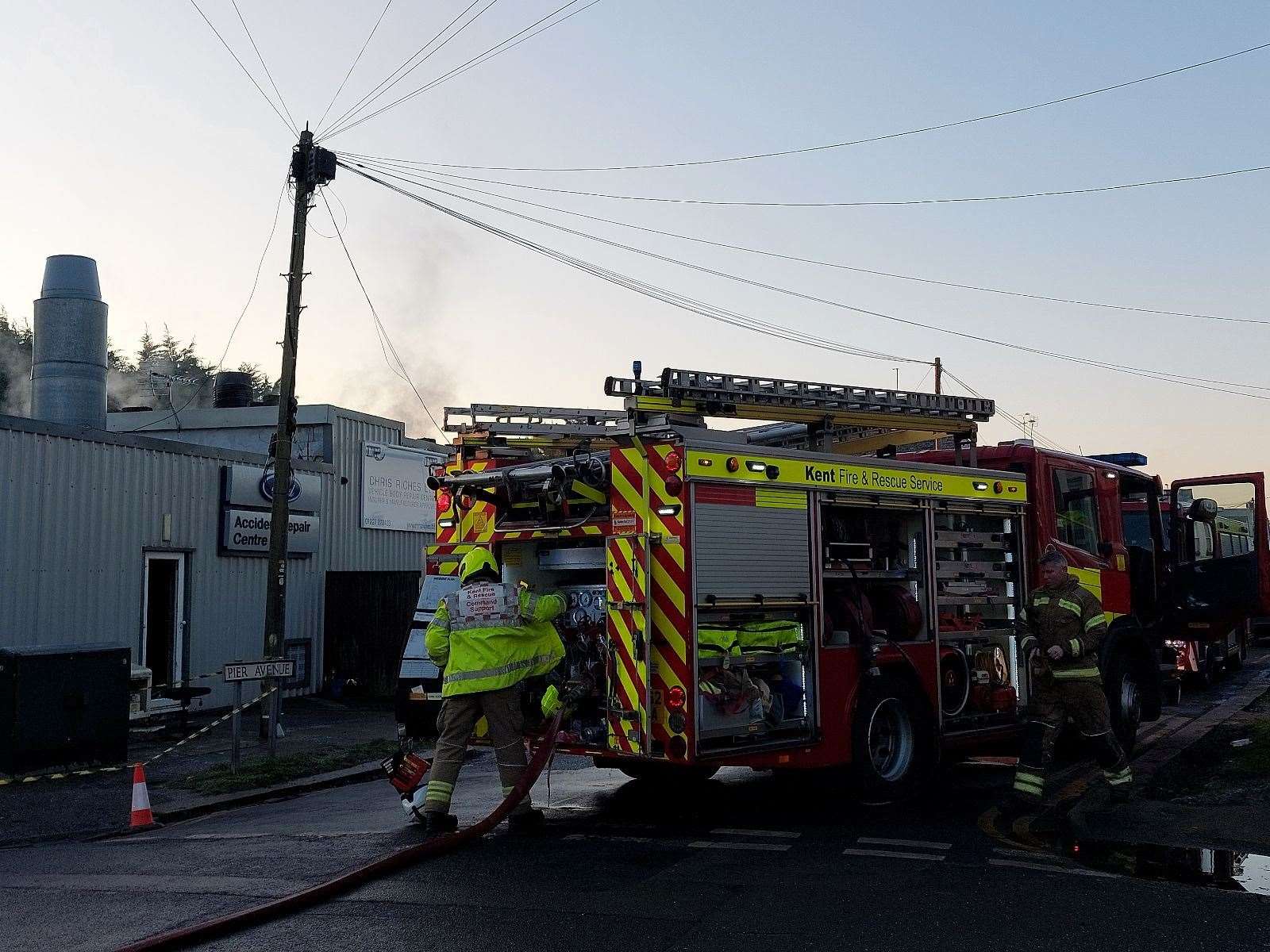 Fire crews outside Chris Riches car repair shop in Pier Avenue, Herne Bay, on Sunday morning