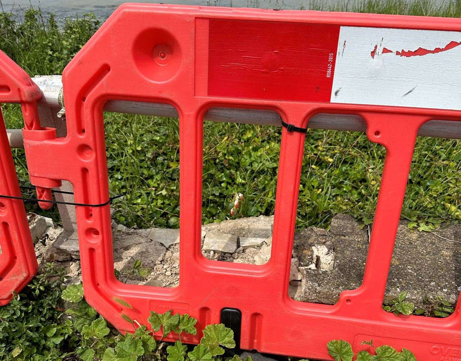 The three-year-old then managed to get through the gap in the red fence. Picture: Laura Mitchell