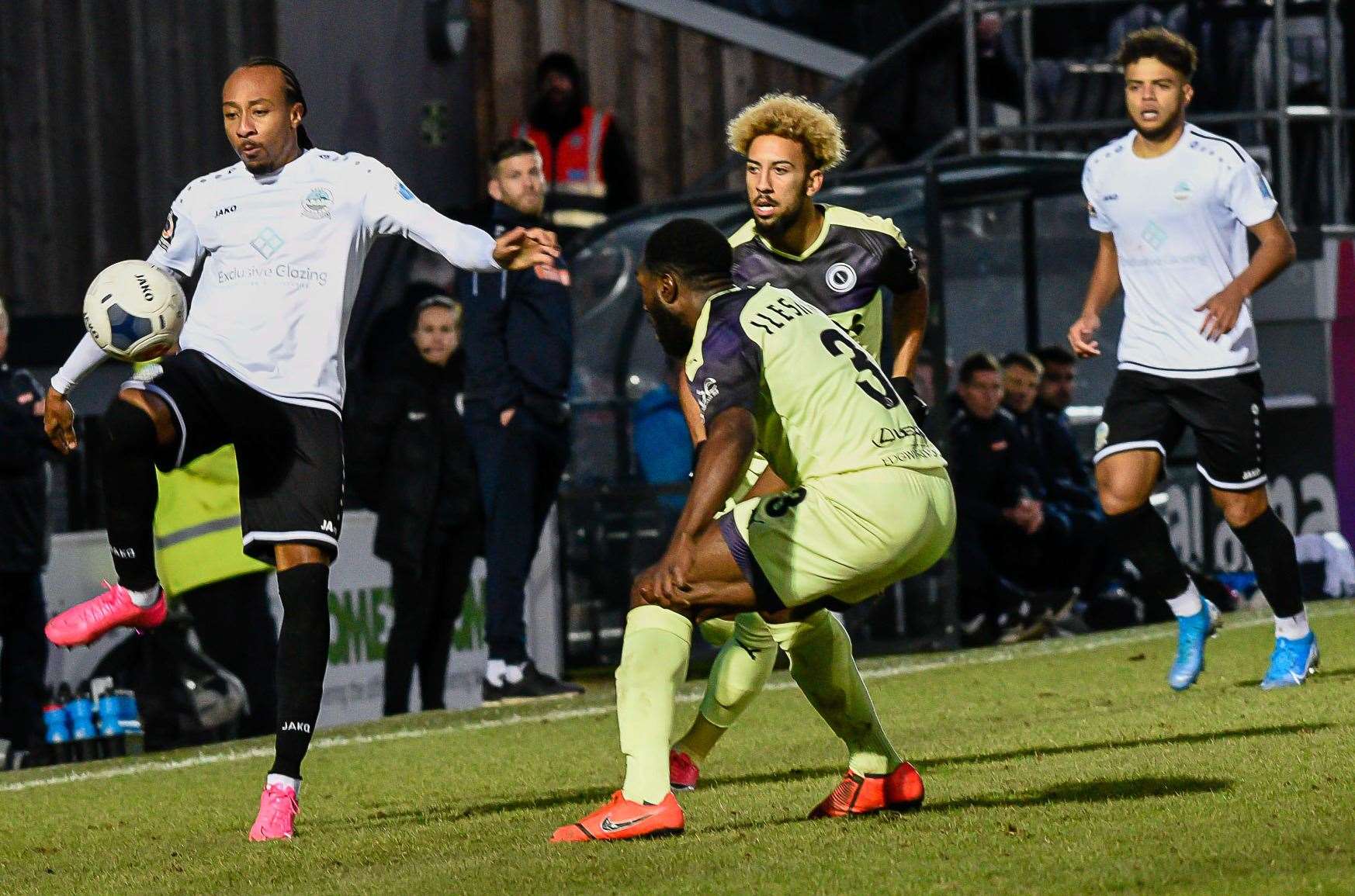 Dover's Ricky Modeste looks to get the ball down against Boreham Wood Picture: Alan Langley