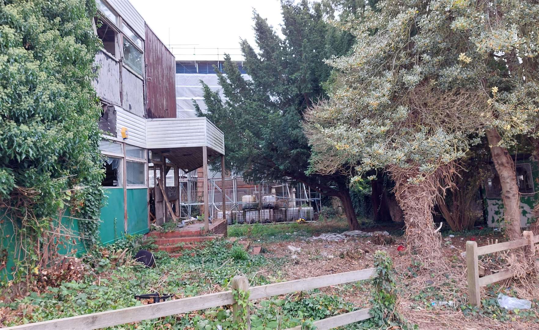 Windows have been smashed on the former office block in front of Whist House