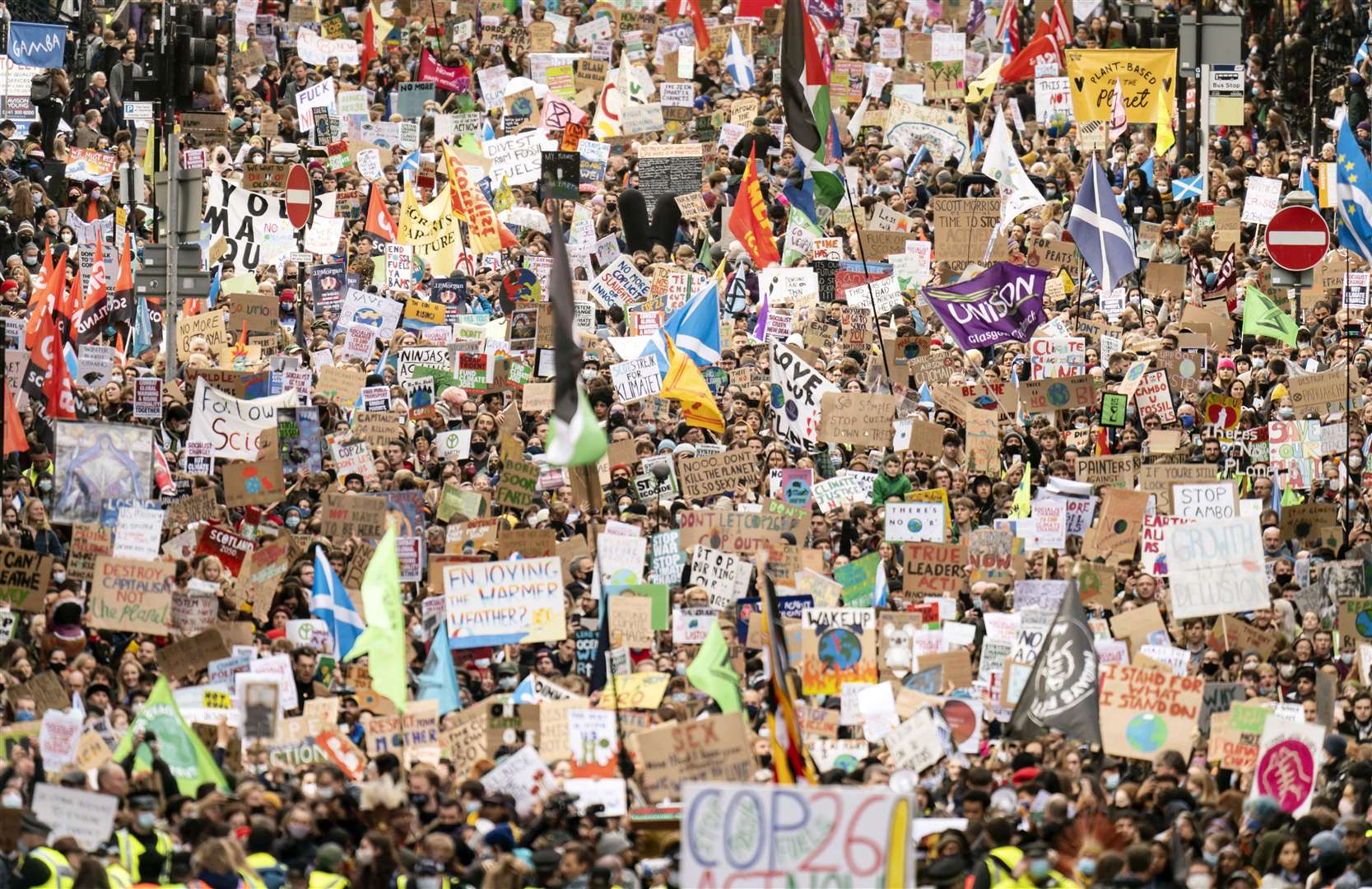 Demonstrators march through Glasgow (Danny Lawson/PA)