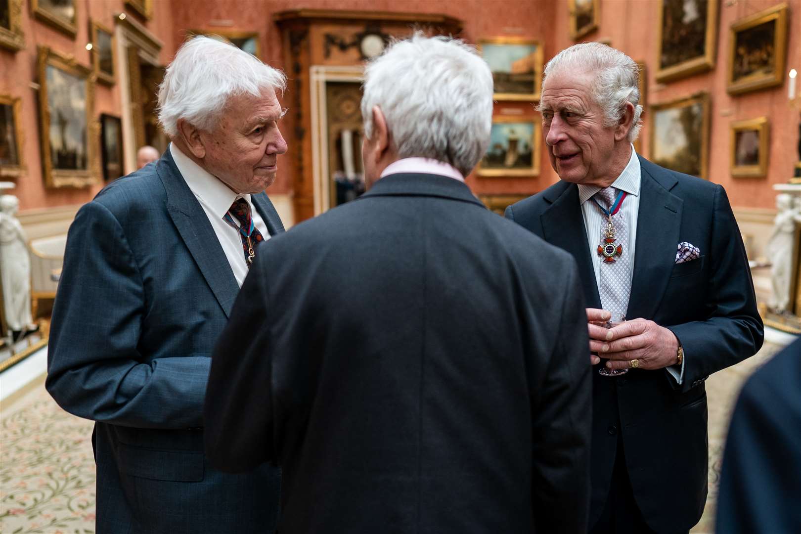 Sir David Attenborough (left) and geneticist and cell biologist Sir Paul Nurse (centre) chat to the King during the reception (Aaron Chown/PA)