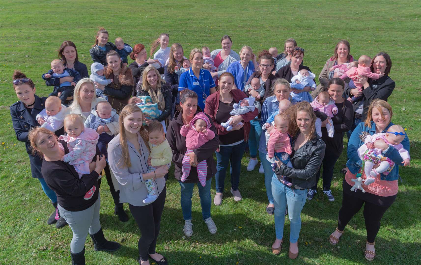 The midwives with their new-borns