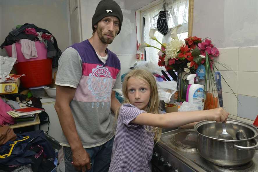 Gavin Flisher and Lacieann cooking dinner in their kitchen